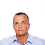 portrait of handsome man posing in studio on white background