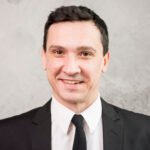 smiling happy businessman looking camera