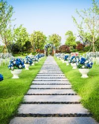 Weeding beautiful wedding flower arrangement of seats along the aisle