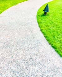 Edging stone path way around beautiful garden